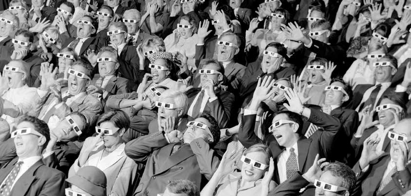 an audience watching a 3d film