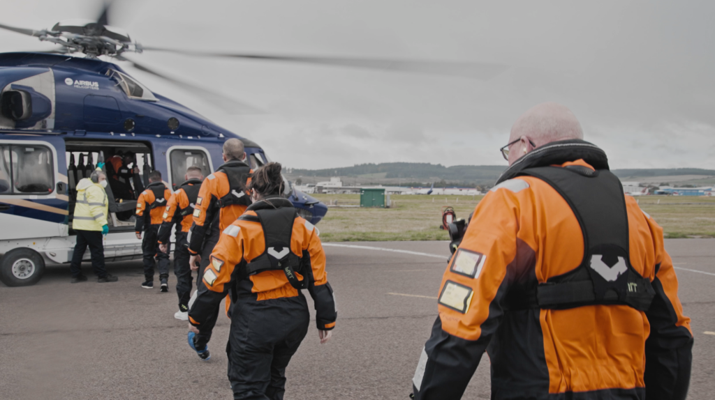 crew-walking-towards-helicopter